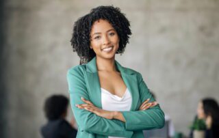 Professional coach standing confidently in a modern workspace after receiving premium virtual support