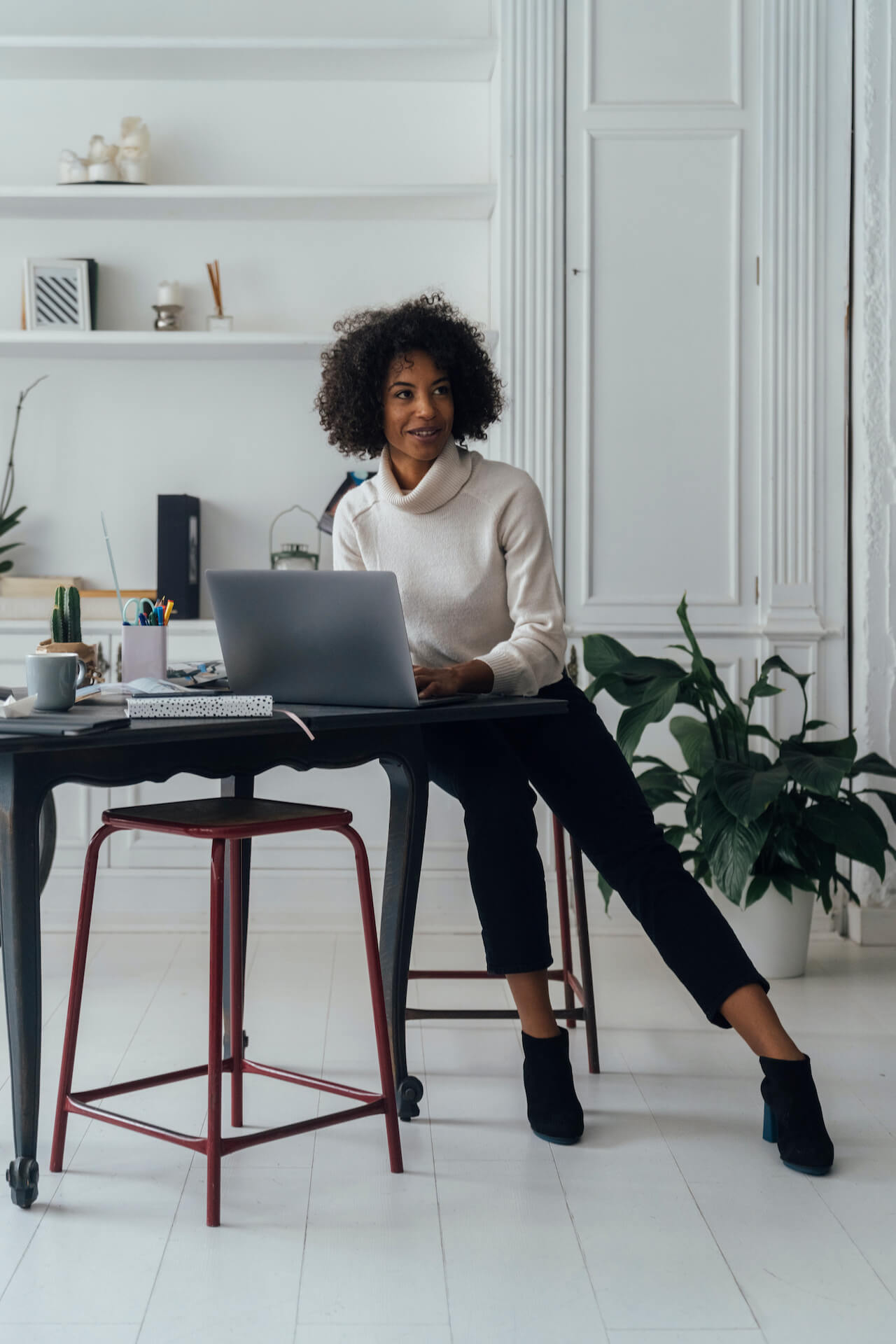 mid-adult-woman-working-in-her-home-office-using-2024-09-22-08-11-43-utc (1) virtual social media strategy