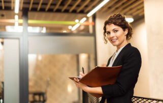 Business woman organizing step-by-step guide for function-based delegation implementation