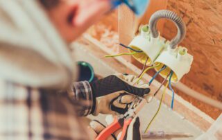 electrician focusing on work after hiring a virtual support specialist