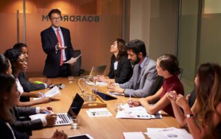 business consultant leading meeting