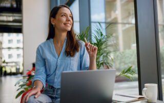 woman thinking of tasks to delegate as a business owner