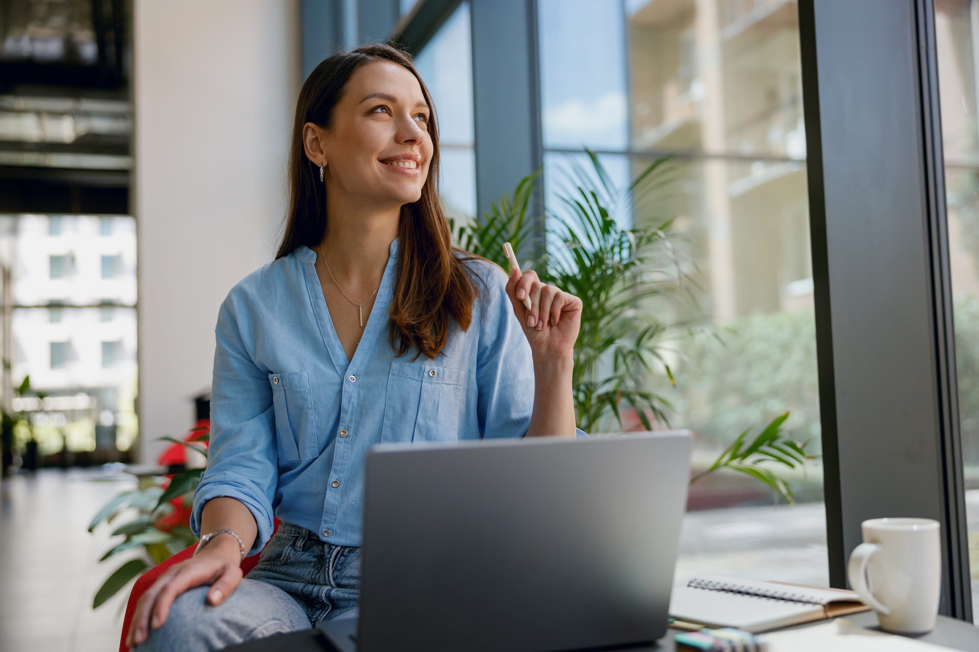 woman thinking of tasks to delegate as a business owner